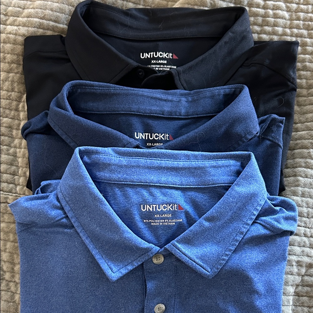 Men’s untuckit 
Polo shirts
Xxl 
3 shirts   dark, med, and light blue
Lot of 3